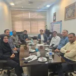 Image of a visit to the server room at Al-Zahra Hospital
